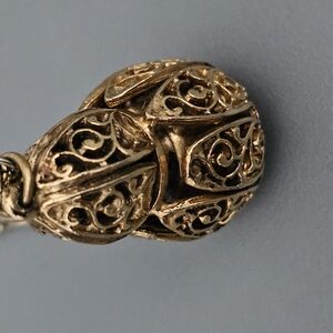 Elegant Gold Filigree Pendant